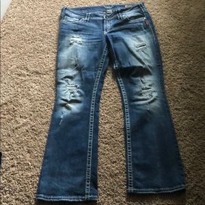 Woman’s silver jeans